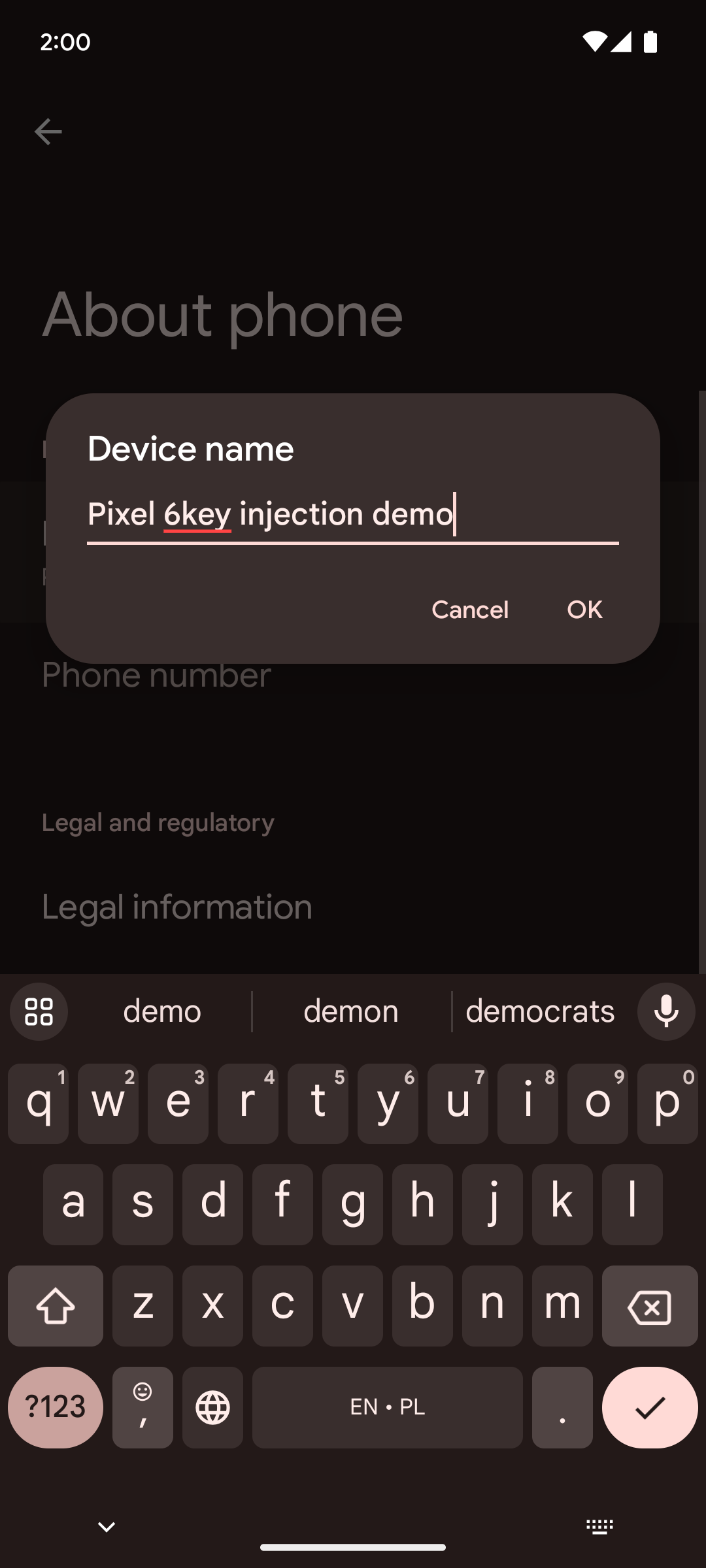 “关于手机”设置屏幕的截图，带有“设备名称”对话框，其中输入了“key injection demo”